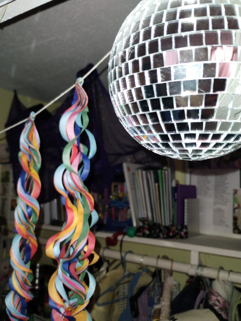 Disco ball and streamers.